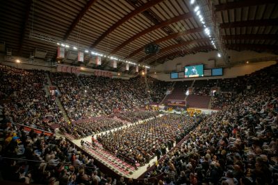 A wide view of the fall 2023 commencement in Cassell Coliseum.