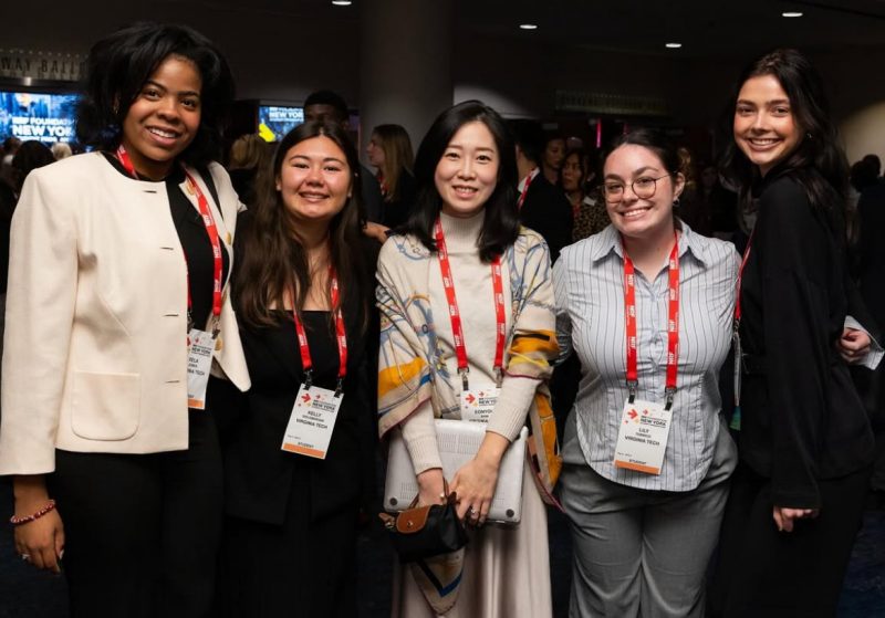 Students together at a conference.