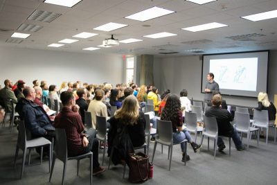 Person lecturing in front of class