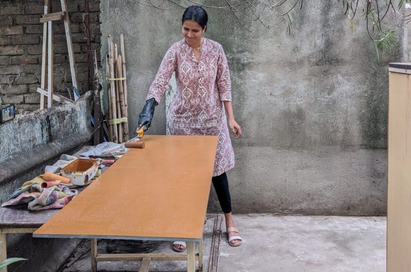 Diksha Pilania works on a piece of flexible furniture for her design project in India. 