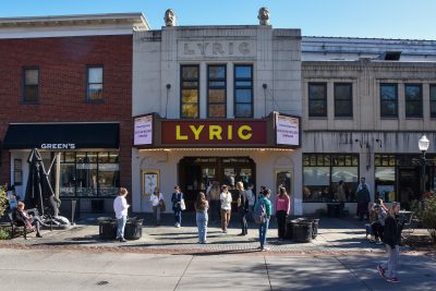Students and faculty arrive at the Lyric Theater in Downtown Blacksburg.